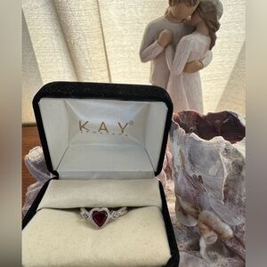 Kay Jewelers 10K White Gold Ring with Red Heart Gem.